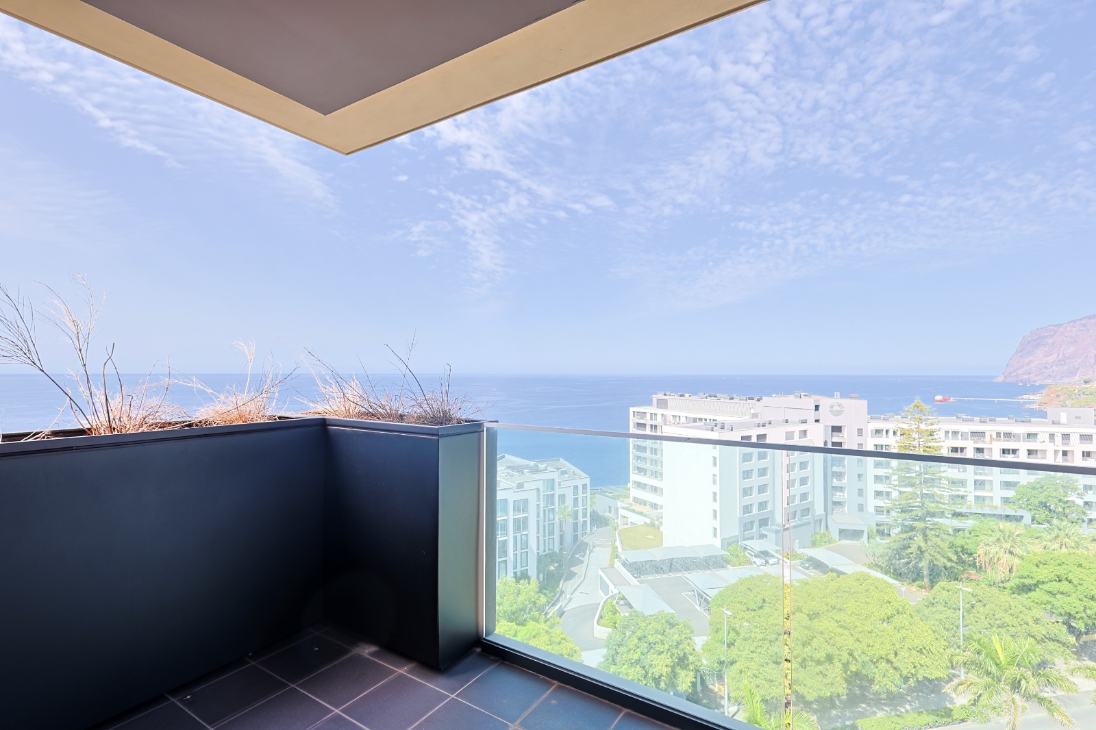 Glazed balcony overlooking the gardens and the coastline of Funchal, Varino 07