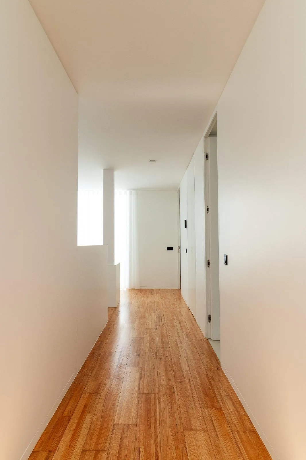 Hallway with wooden flooring leading to the bedrooms, Casa Branca, Funchal